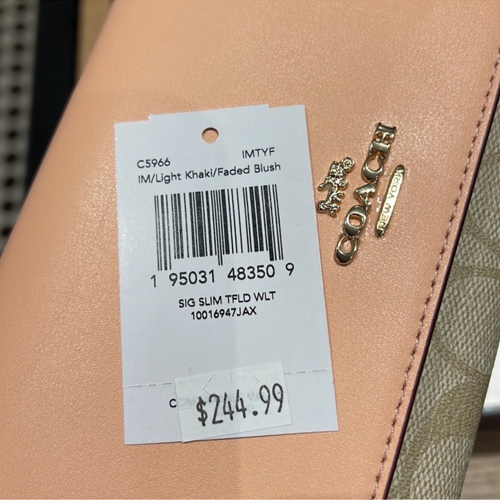 Coach Slim Trifold Wallet In Signature Canvas
IM/Light Khaki/Faded Blush - Picture 10 of 16